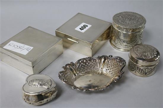 A pair of 1930s Art Deco silver cigarette boxes by J.W. Benson Ltd, London, 1934/8, together with three silver boxes & a dish.